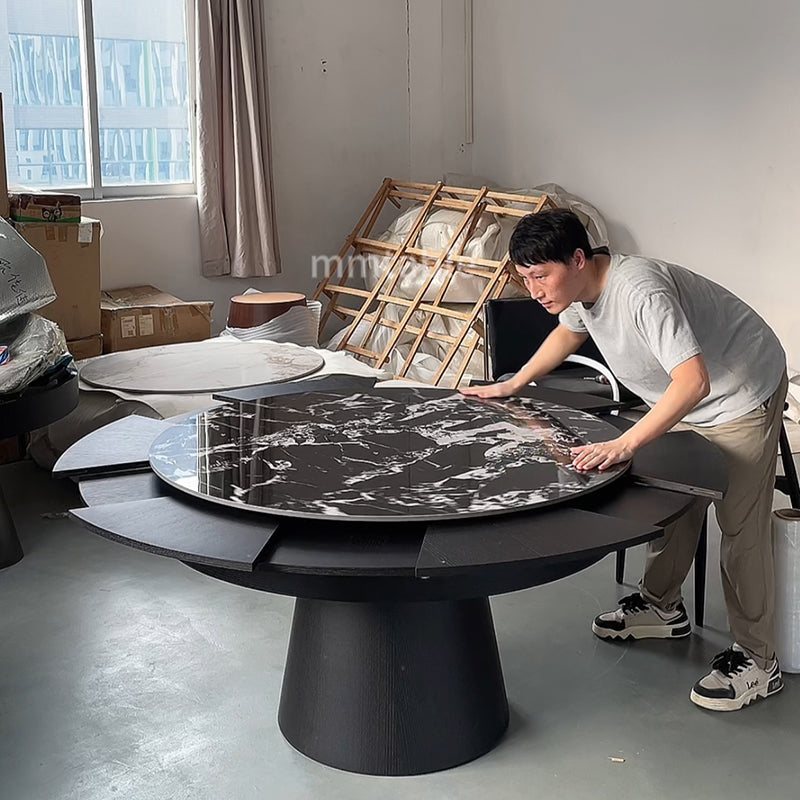 table ronde extensible noires de 1,3 à 1,8 mètres