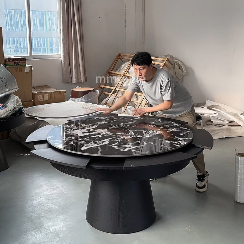 table ronde extensible noires de 1,3 à 1,8 mètres