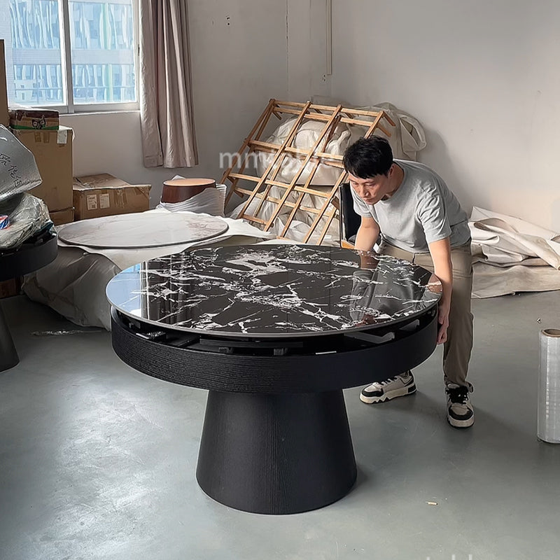 table ronde extensible noires de 1,3 à 1,8 mètres