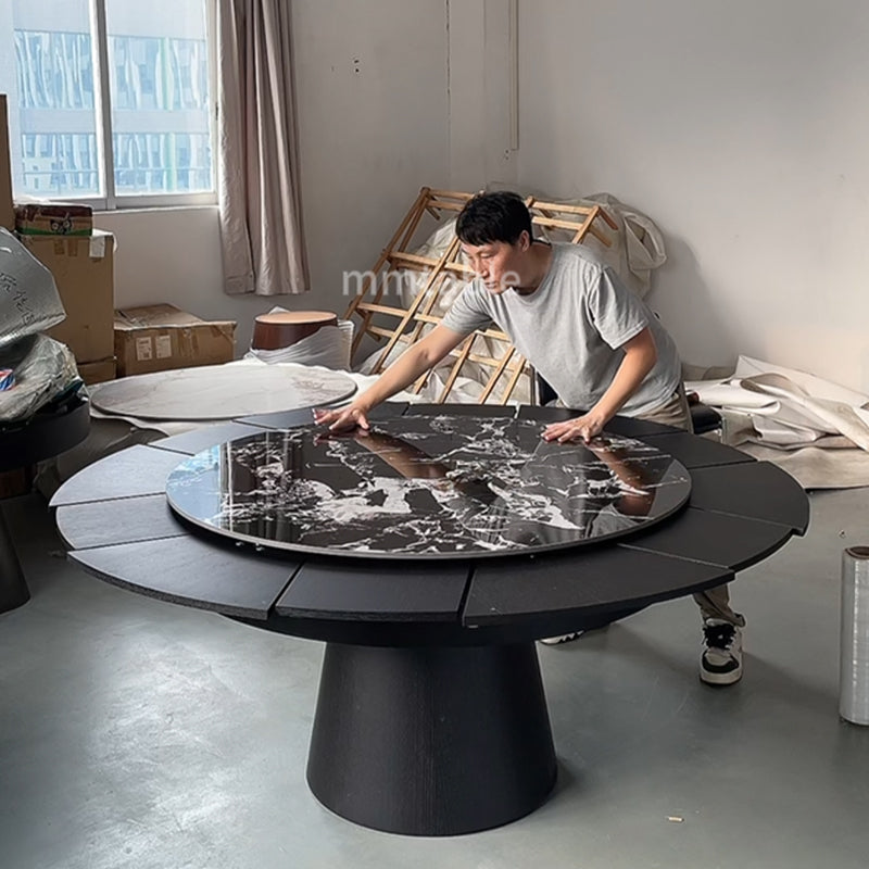 table ronde extensible noires de 1,3 à 1,8 mètres